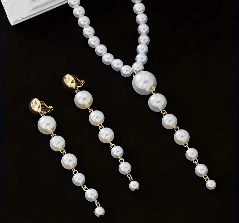 Clip on gold and white pearl necklace and earring set